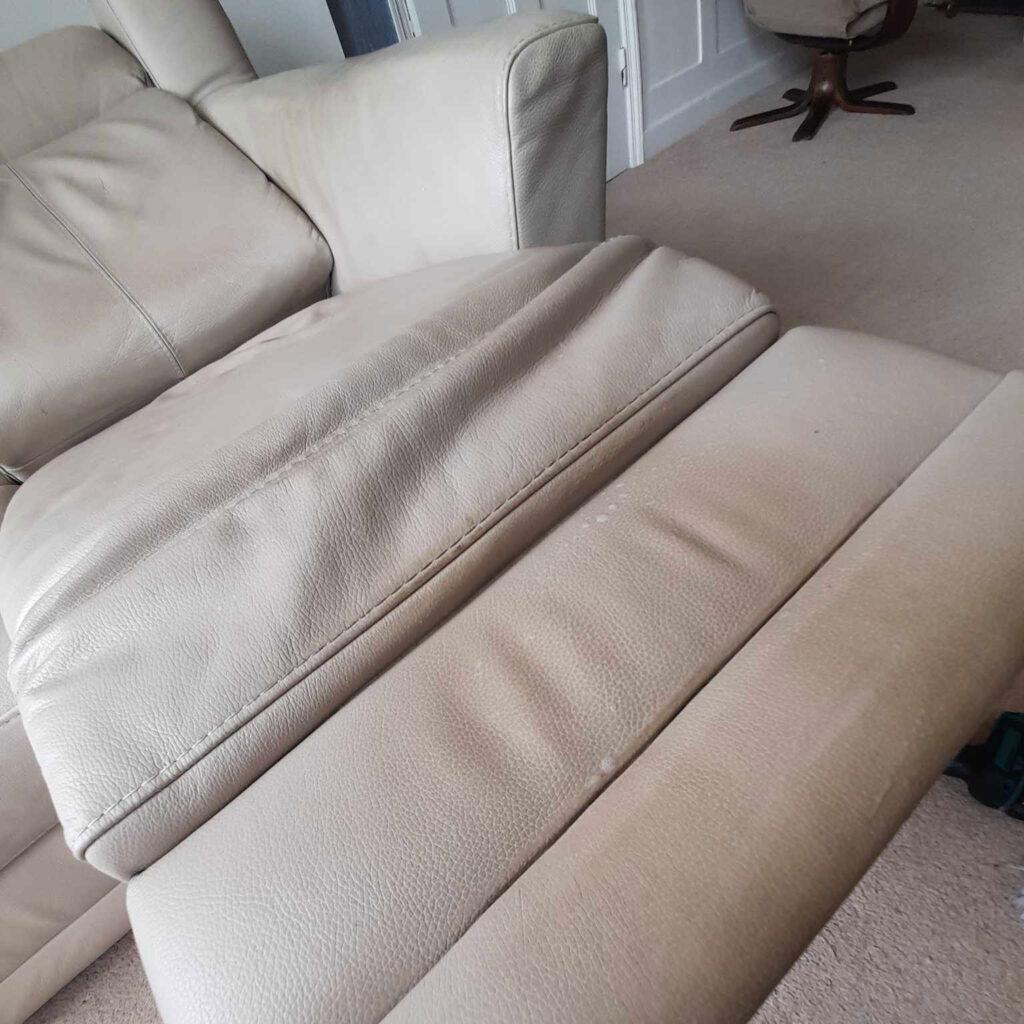 stained leather sofa - the client had been trying to clean it with Cilit Bang